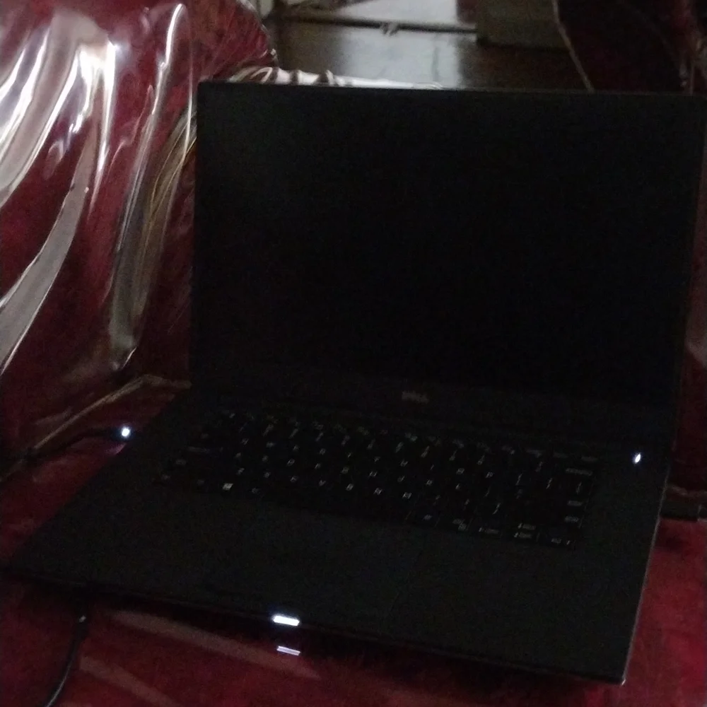 Dell Laptop Silver With Chrome Trim And Cuts